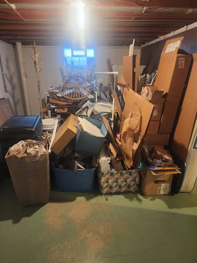 Roll-off dumpster container at job site for 4 Yard Dumpster Rental in Emma